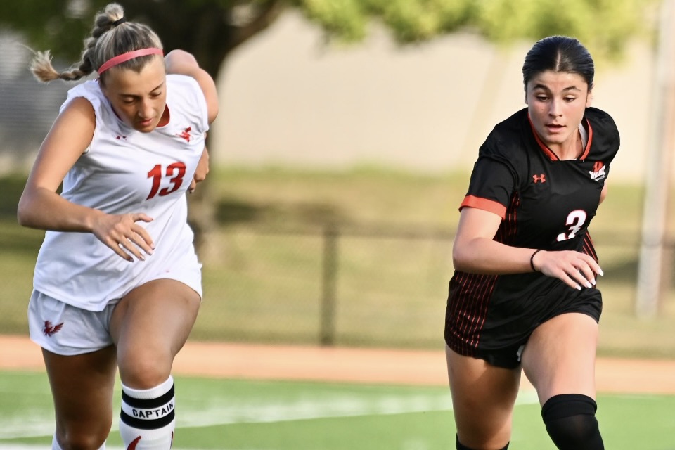 Junior Avery Umina runs after ball beating her opponent. Umina plays for FC Starts Elite Clubs National League Regional Blue Team.